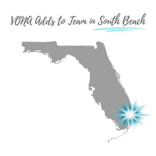 The shape of the state of Florida is shown in grey, with the text above it "VONA Adds to Team in South Beach." A teal colored starburst is shown over the city of Miami area of the state graphic.